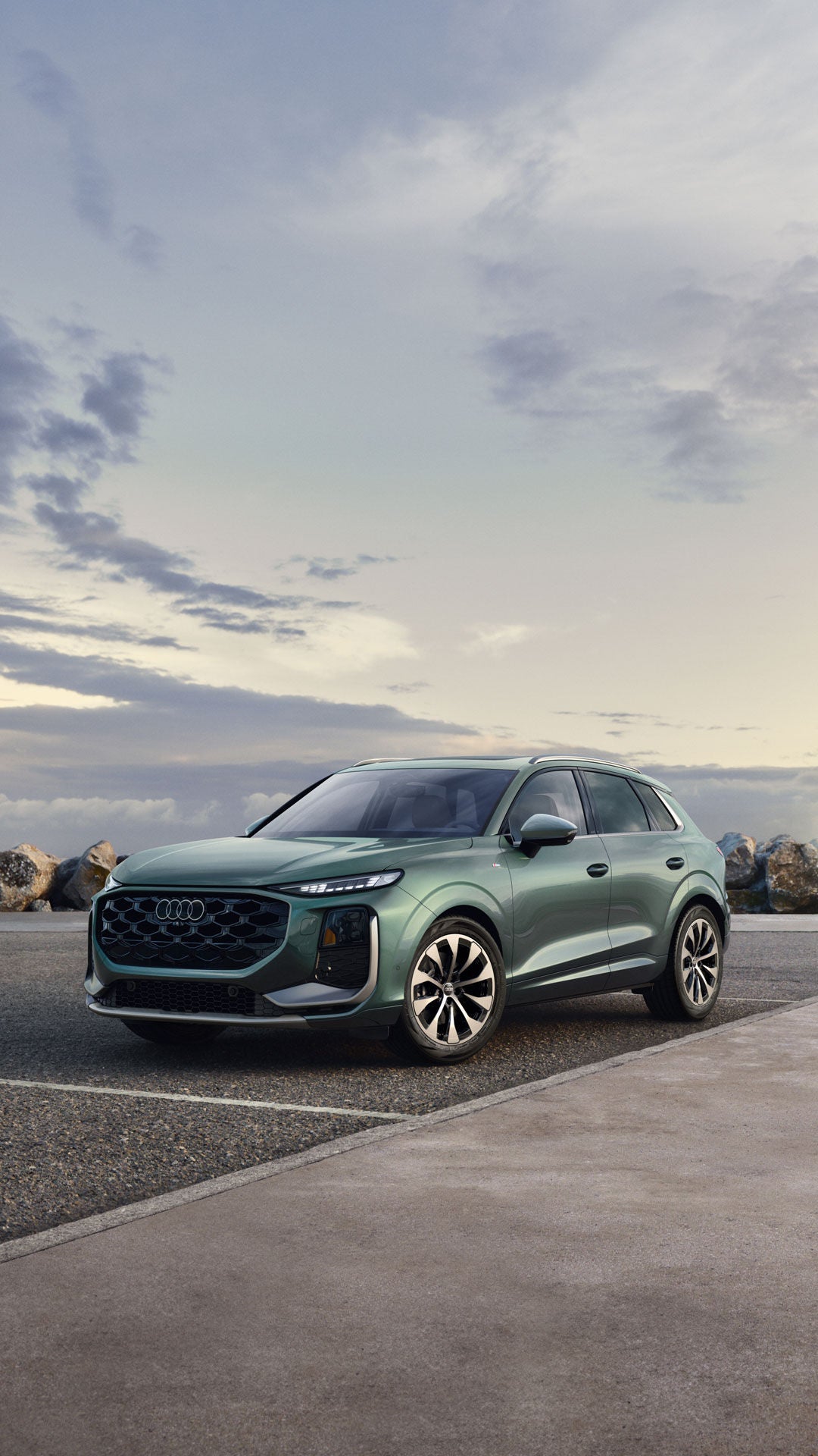 Three-quarter side profile of an Audi SQ5.