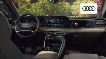 Interior view of the 2025 Audi Q5 showing luxury seating and tech features 