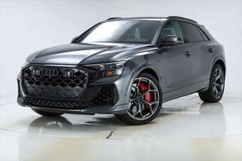 Side profile of an Audi parked.