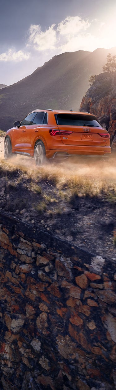 Audi Q3 driving on terrain