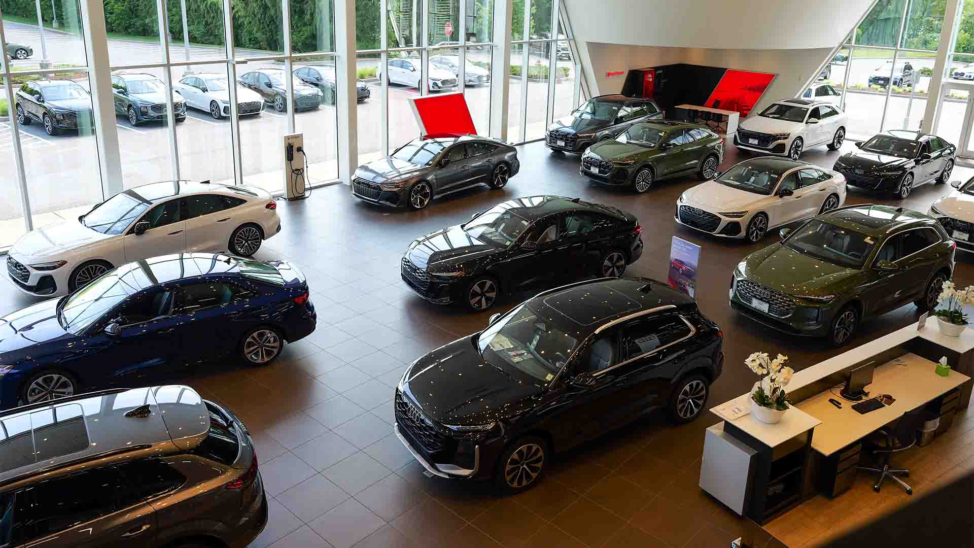 Audi employee polishing an Audi SUV