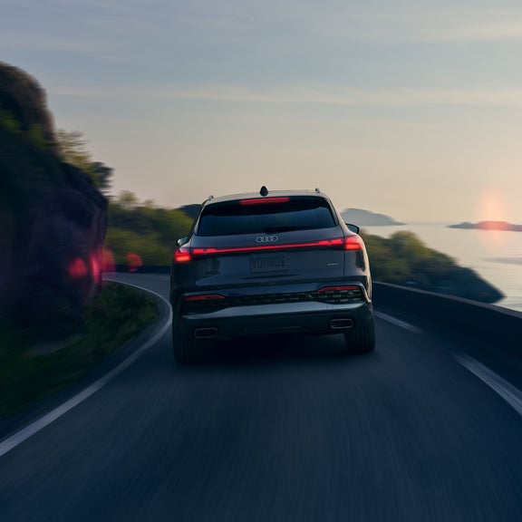 Rear view of the Audi Q5 accelerating.