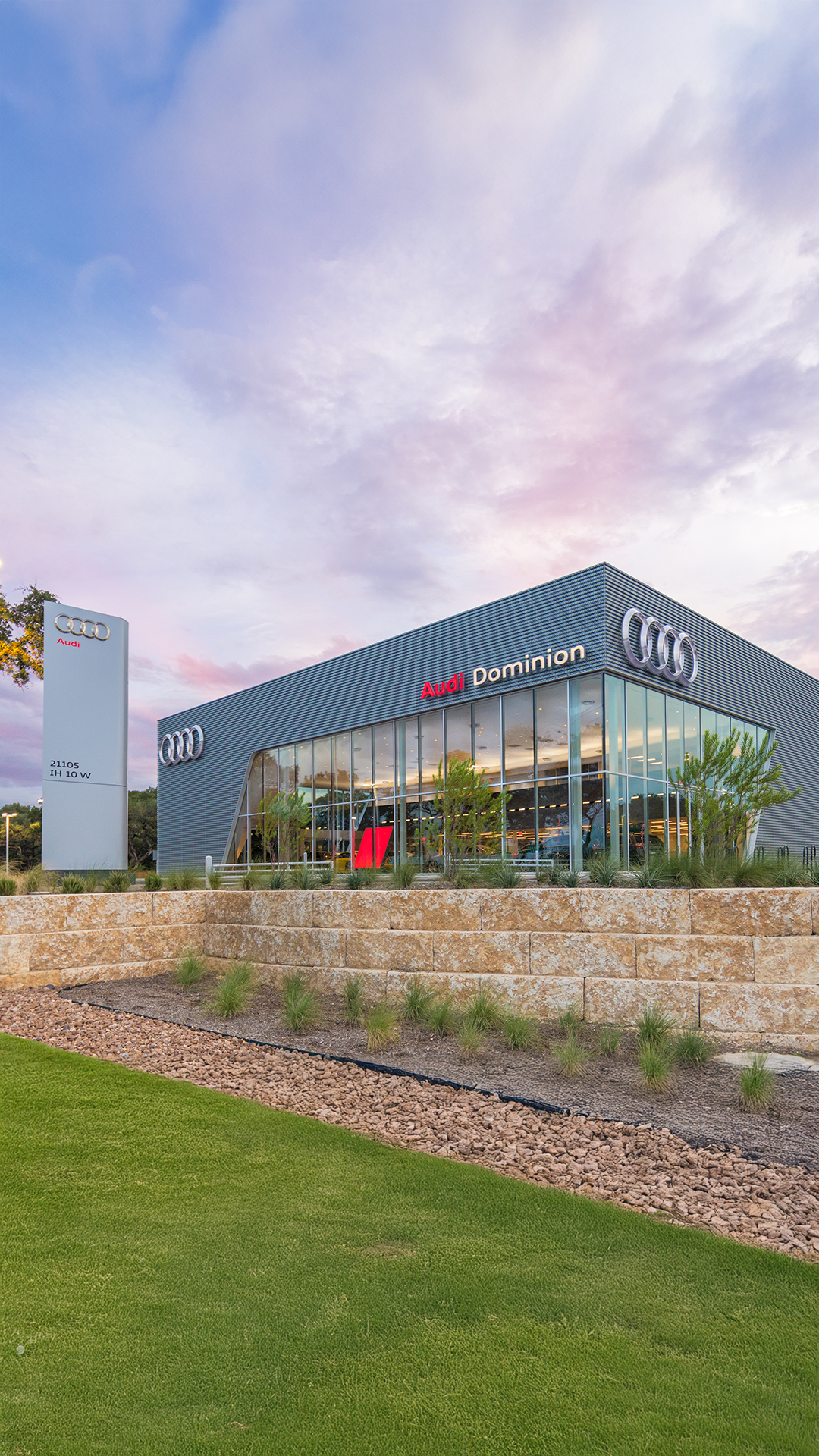 Audi 2025 Audi Q6 e-tron left profile driving.