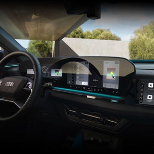 Close-up of the wraparound virtual cockpit in the Audi Q6 e-tron.