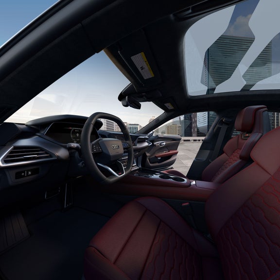 Interior view of the Audi S e-tron GT, showing the driver's cockpit and the Nappa leather seating surfaces.