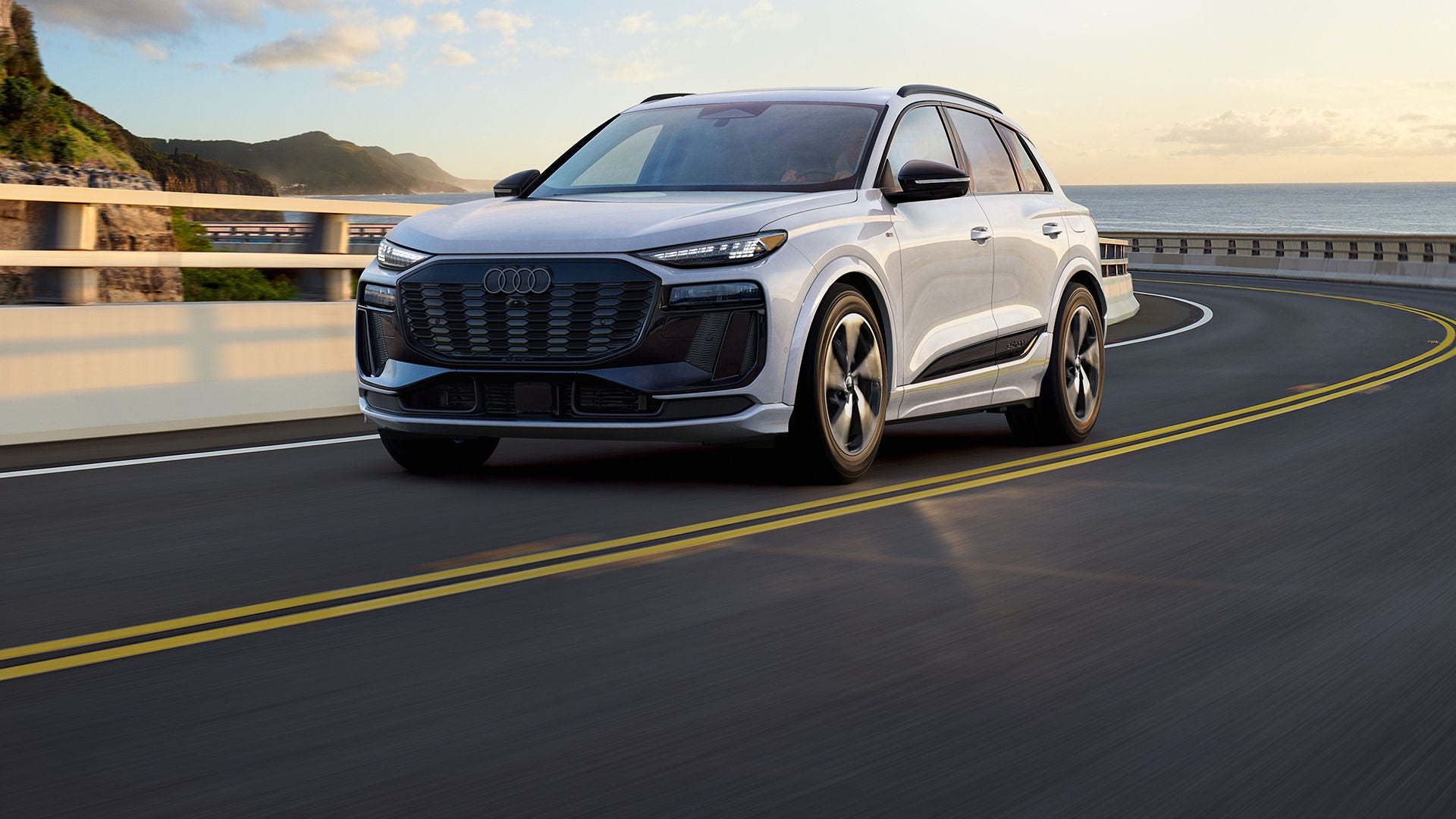 Right profile view of an Audi Q8 e-tron parked.