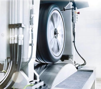 Wheel being aligned on vehicle