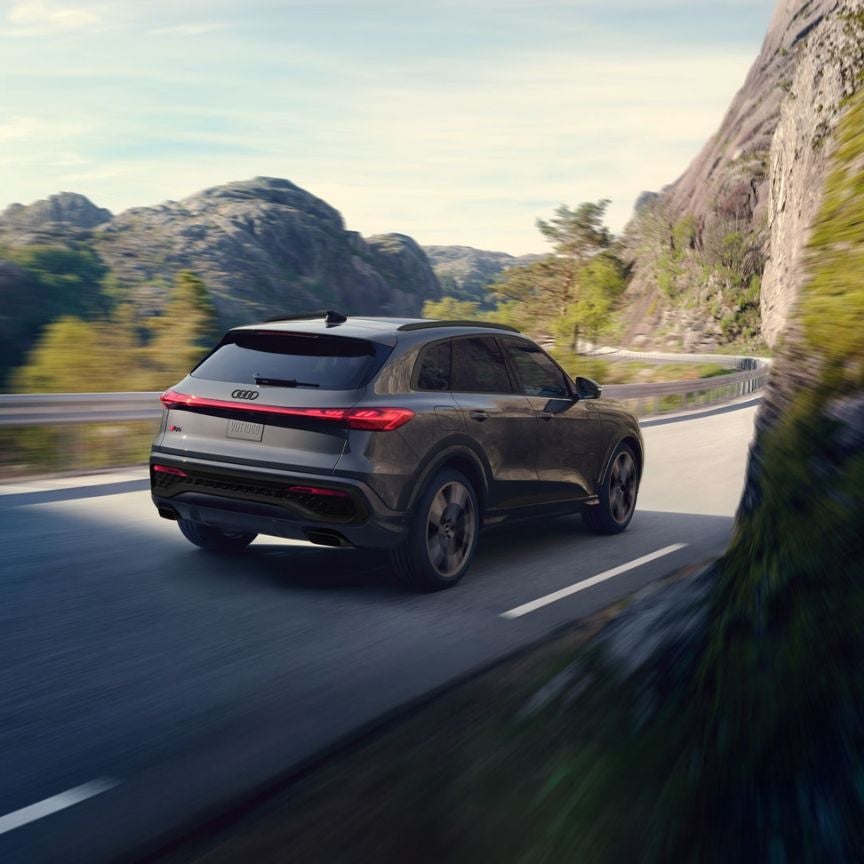 Q5 driving down mountain road