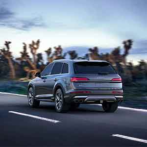 Back view of an Audi SQ7 accelerating.