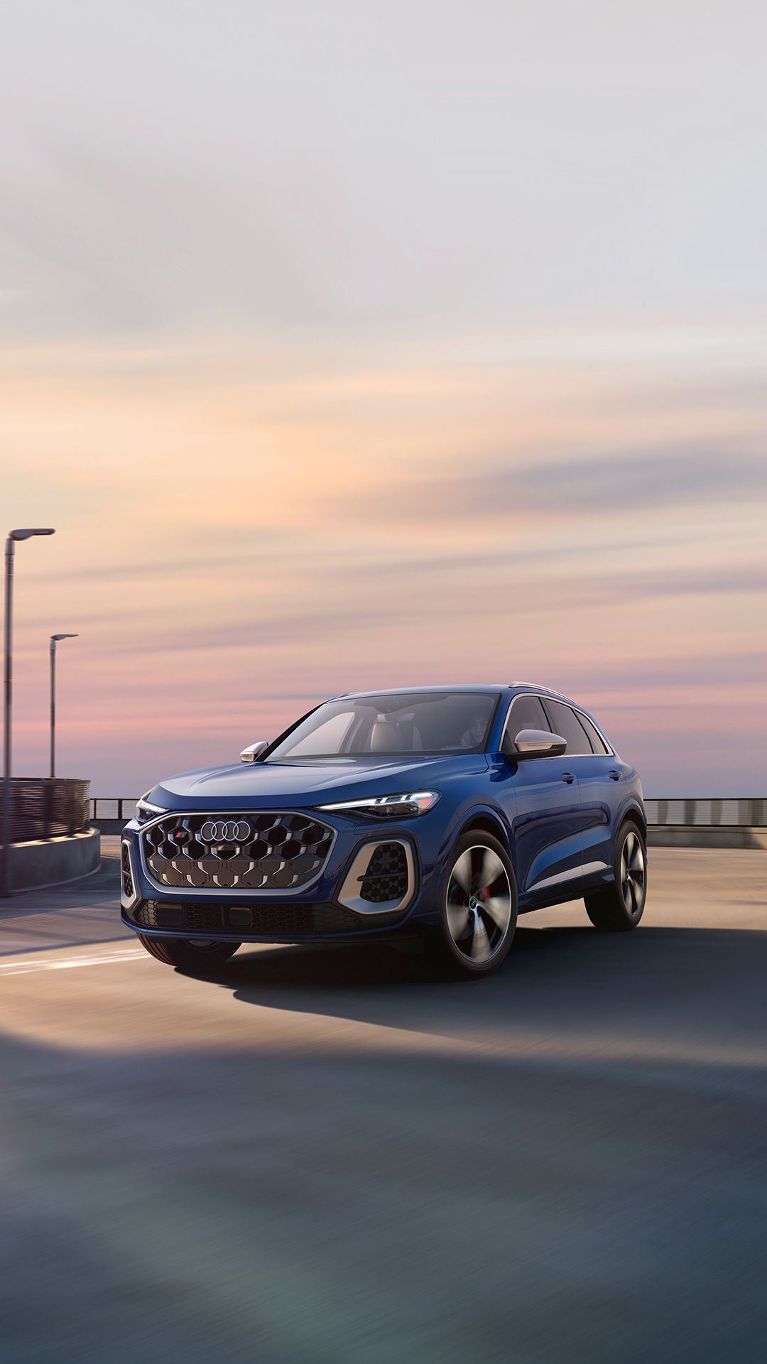 Side profile view of the all-new Audi SQ5 parked.