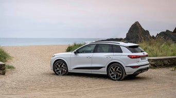 Side view Q6 etron beach photo