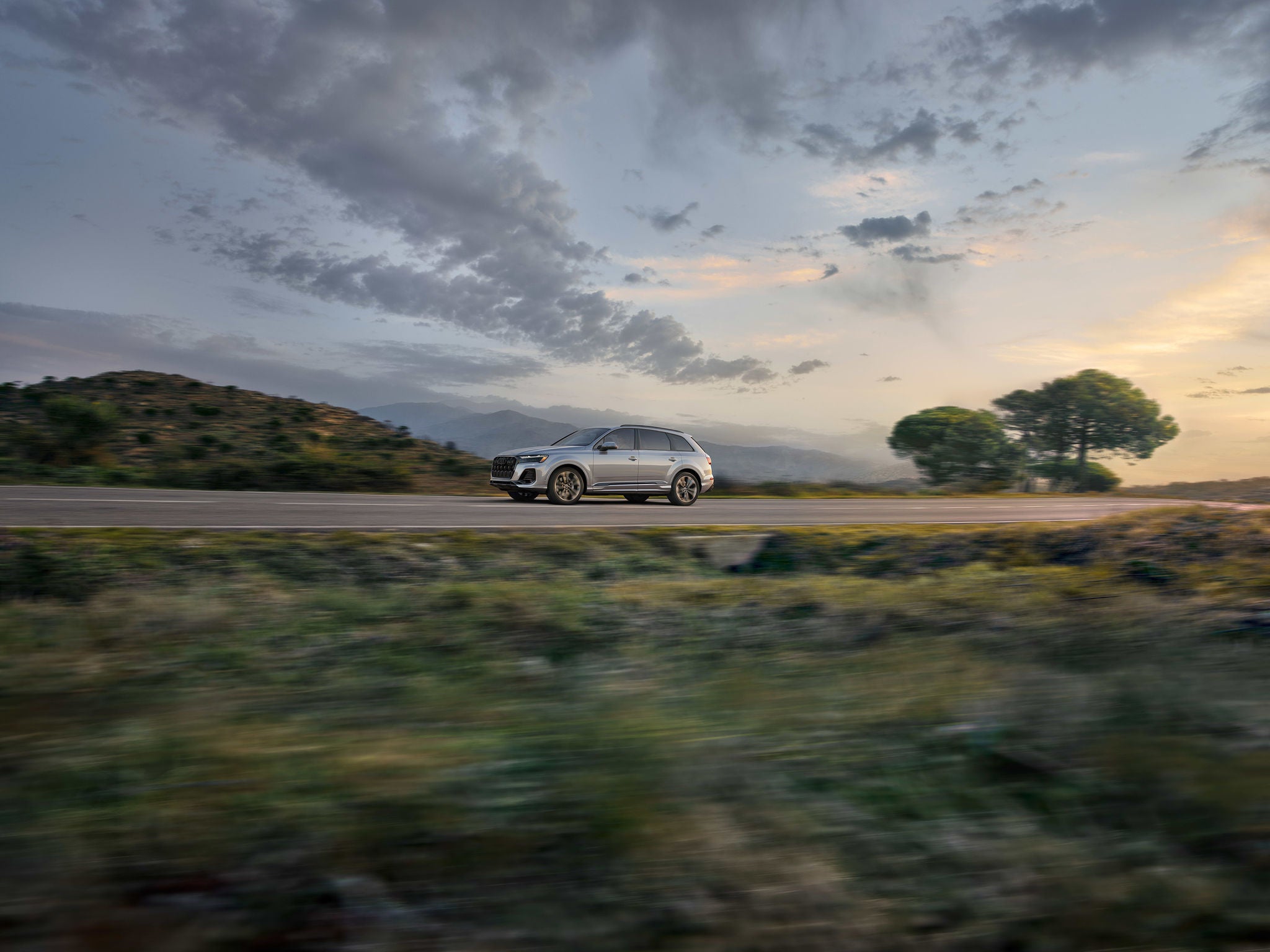 Profile of a pre-owned Audi vehicle at sunset