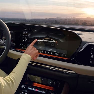 Close-up on the MMI display screen on the Audi A5, showing the Audi drive select feature.