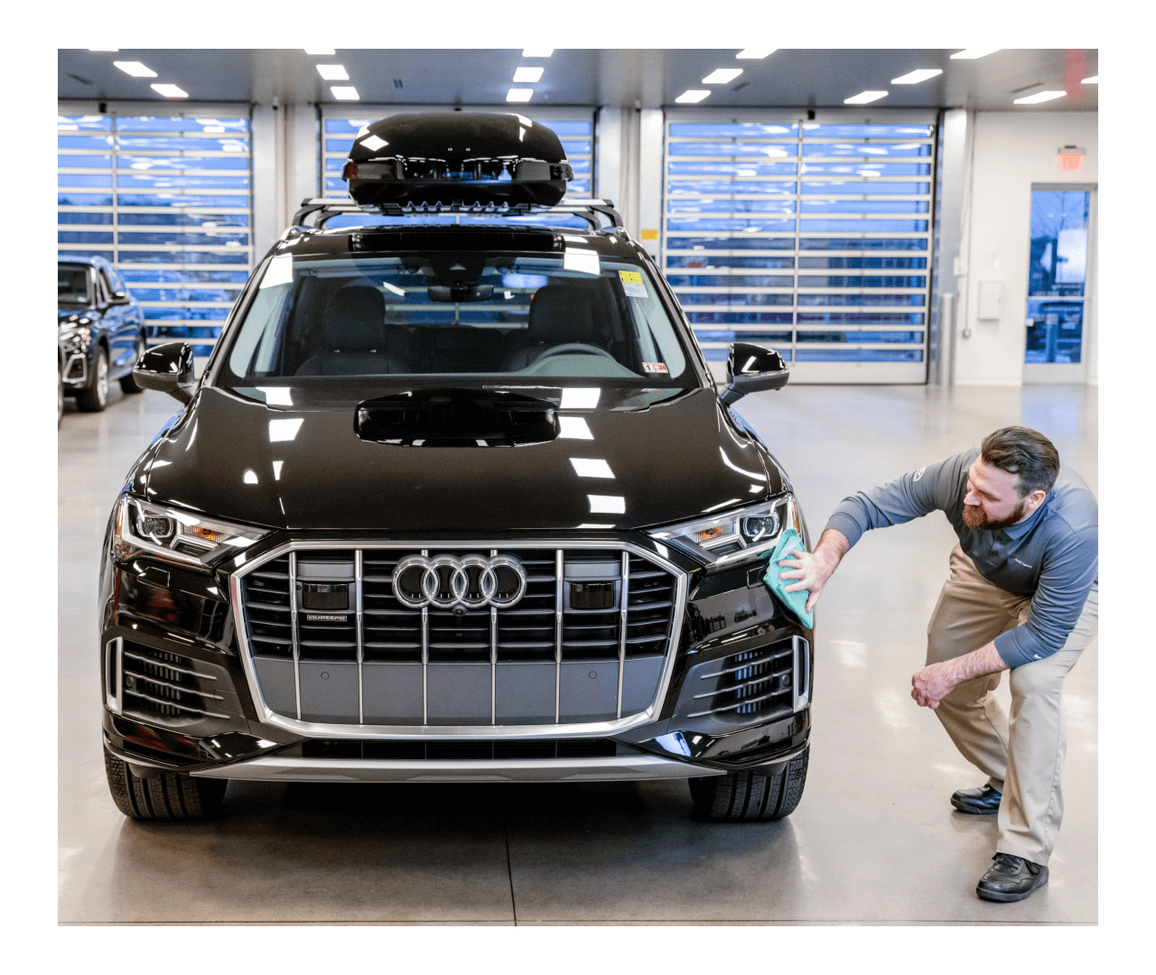 New Audi being polished in a new Audi showroom