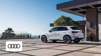 Audi Q3 showing luxury seating and advanced dashboard 