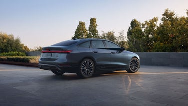 Three-quarter rear view of the Audi A6 e-tron.