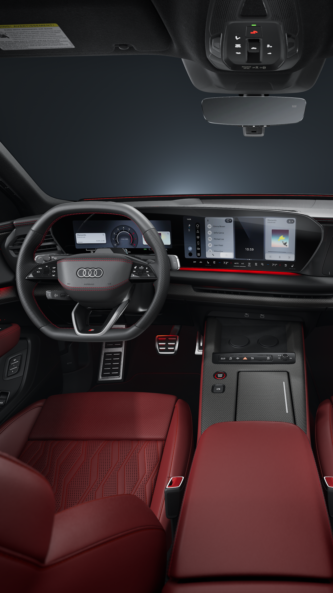 Frontal view from behind of the cockpit, sports seats, and digital displays of the Audi SQ7 SUV.