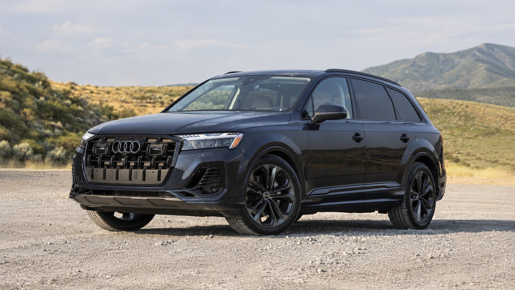 Side profile of a 2026 Audi Q7 compact SUV parked outdoors