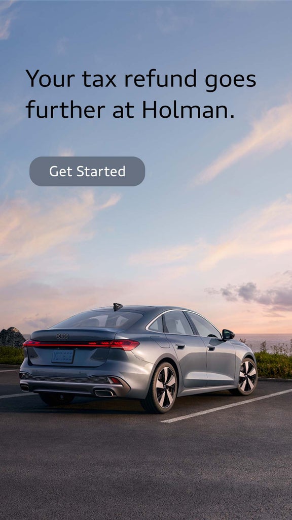 Back view of an Audi driving.