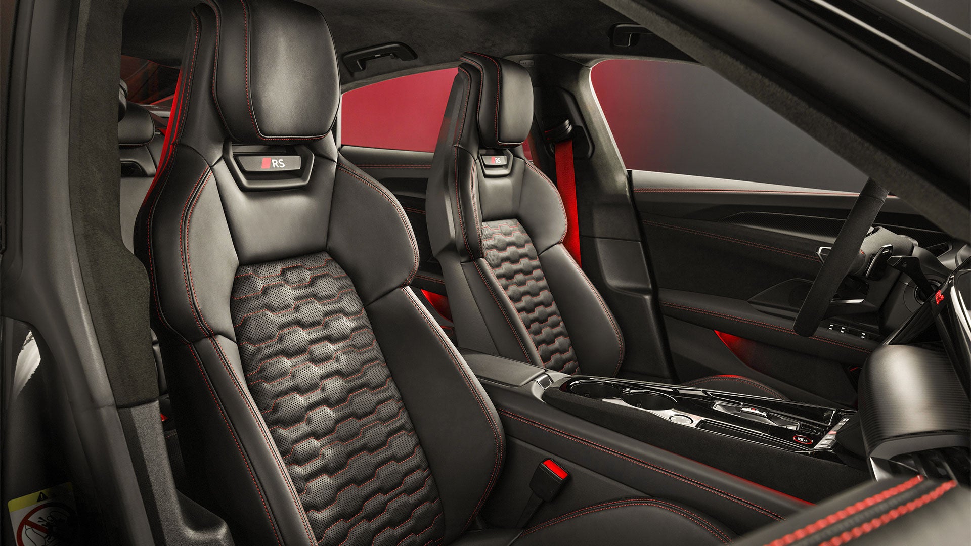 Interior look at luxurious black seats of the e-tron GT.