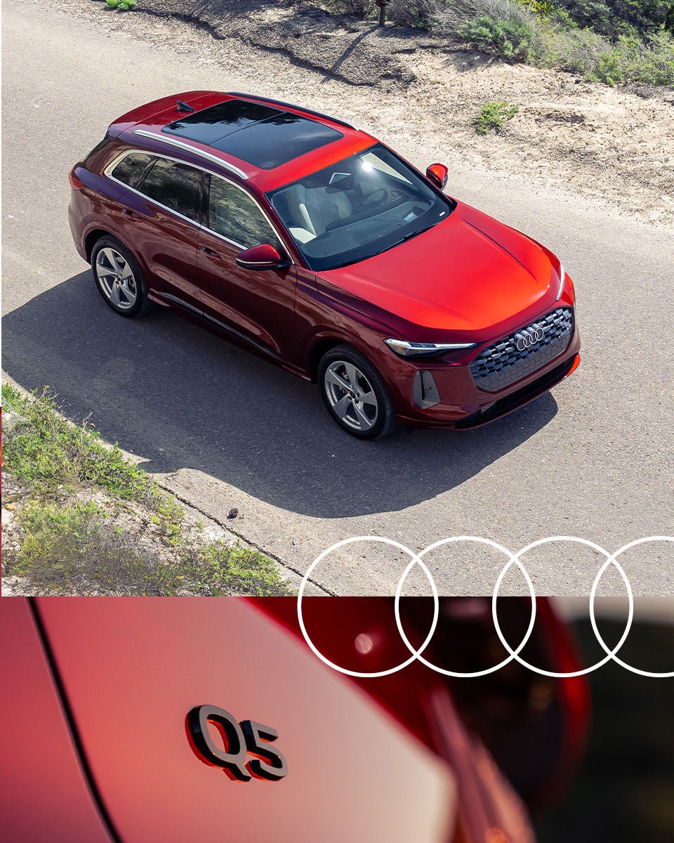 Left side profile view of an Audi Q5 parked.