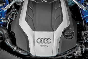 Profile view of vehicle with hood open. 