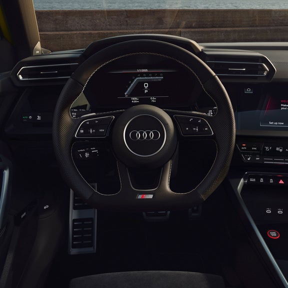 Close-up of the Audi S3 virtual cockpit and steering wheel.