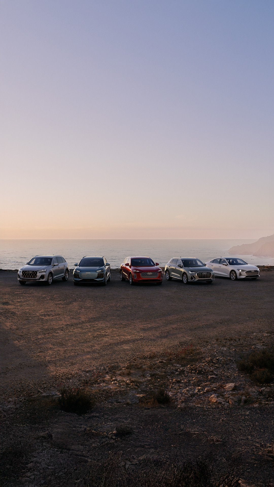 Audi 2025 Audi Q6 e-tron left profile driving.