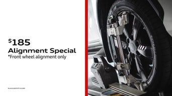 Side view of a tire being fixed.