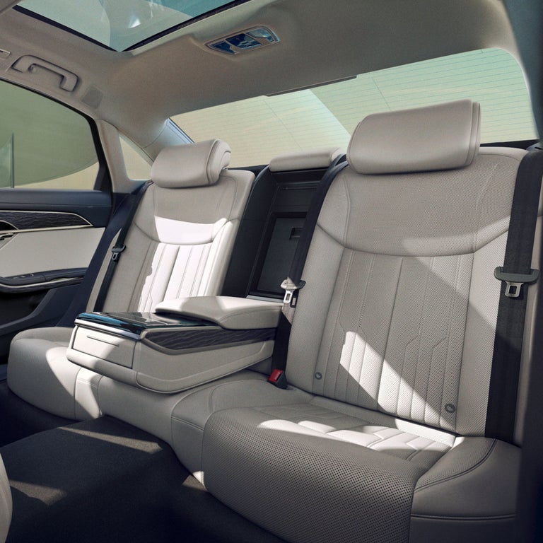 Close-up of the interior cabin, showing the back seats, of the Audi A8.