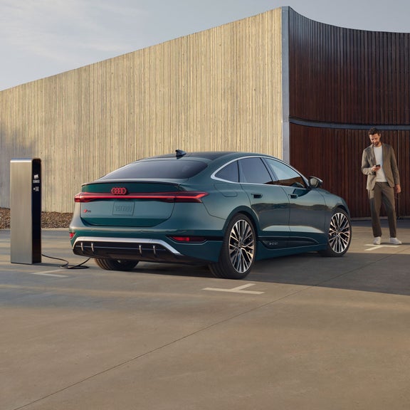 Three-quarter rear view of the Audi S6 e-tron, showing the rear wheels.