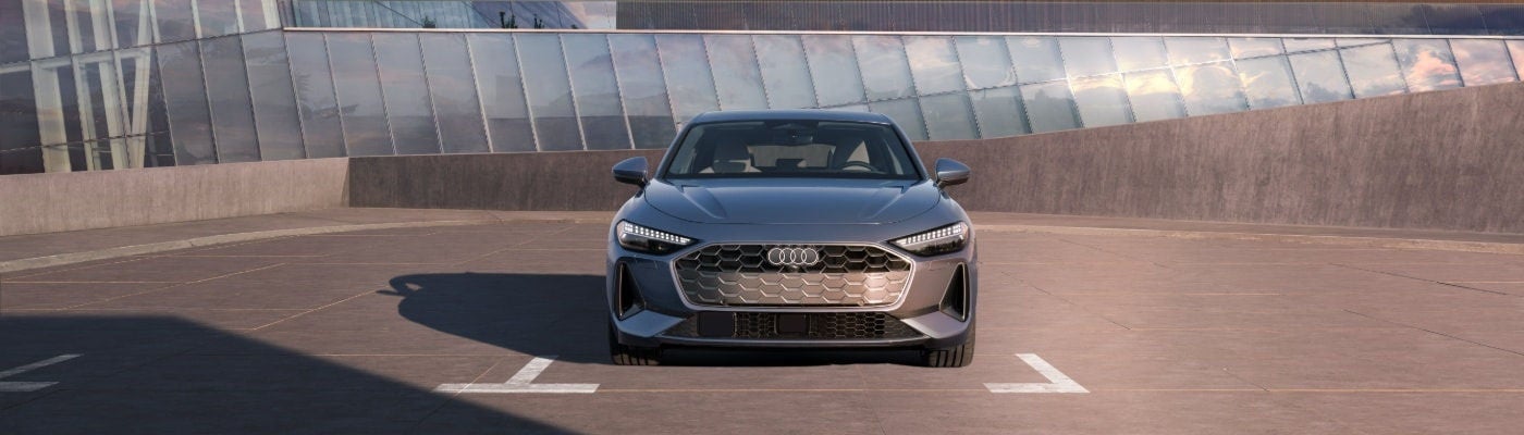 Front view of the Audi A5 featuring the signature Singleframe grille and LED headlights