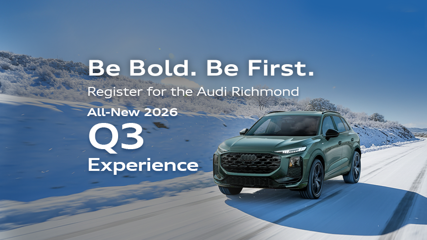 Side profile view of a parked Audi Q3. 