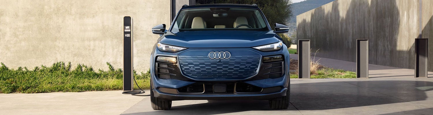 Three quarter view of an Audi Q8 SUV parked.