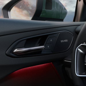 Close-up of the Sonos sound system speakers inside the Audi Q3.