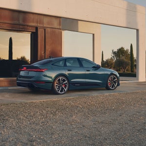Side view of the Audi S6 Sportback e-tron parked.