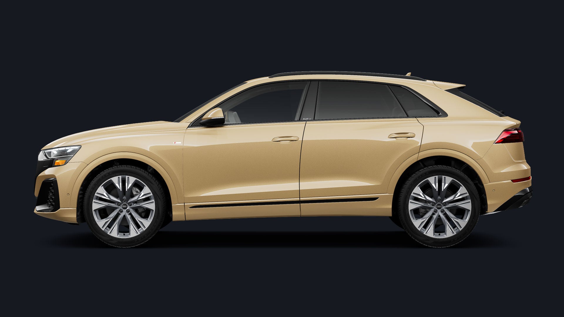 Side-view of a gold Audi Q8.