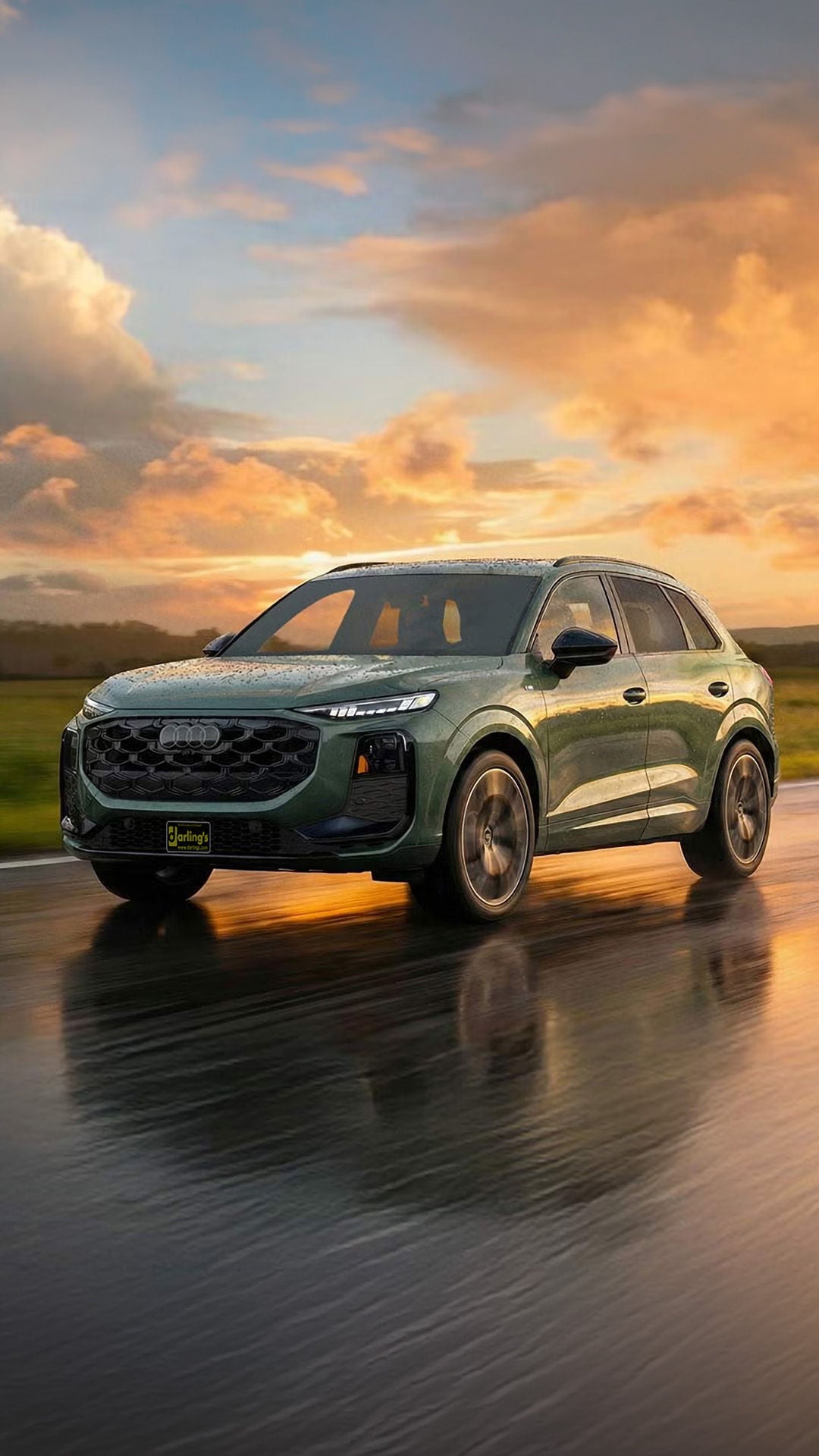 Audi Q3 driving through mountain road in Maine
