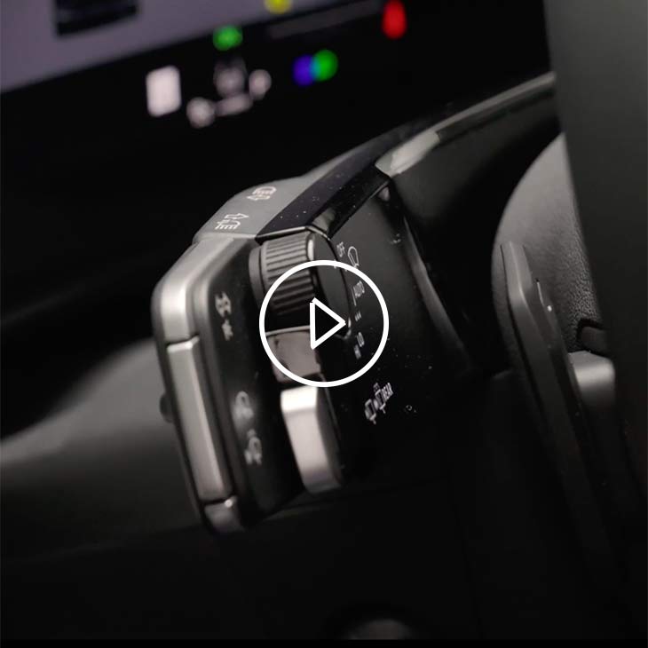 Close-up on an iPhone resting on the middle console of the Audi Q3.