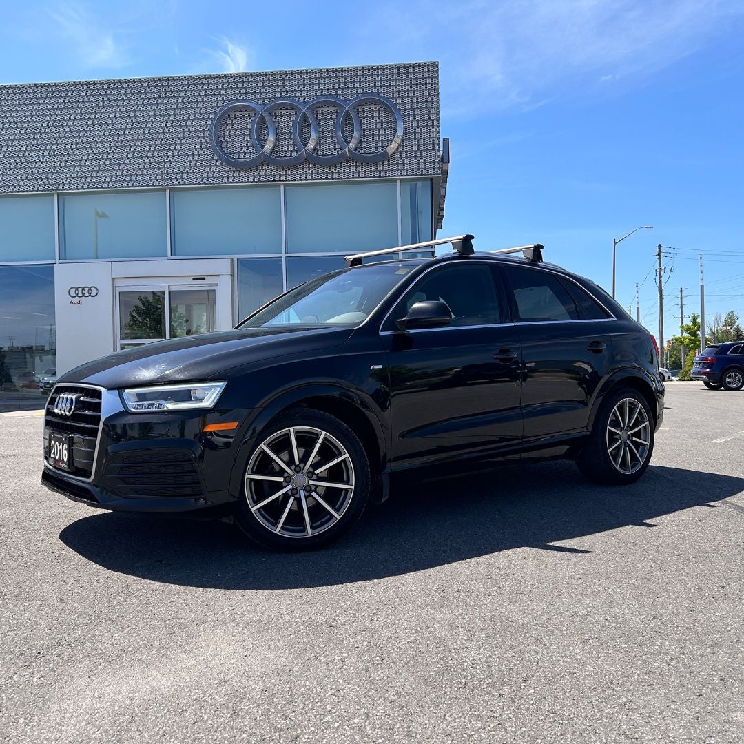 image of a 2016 Audi Q3 in front of Audi Kingston