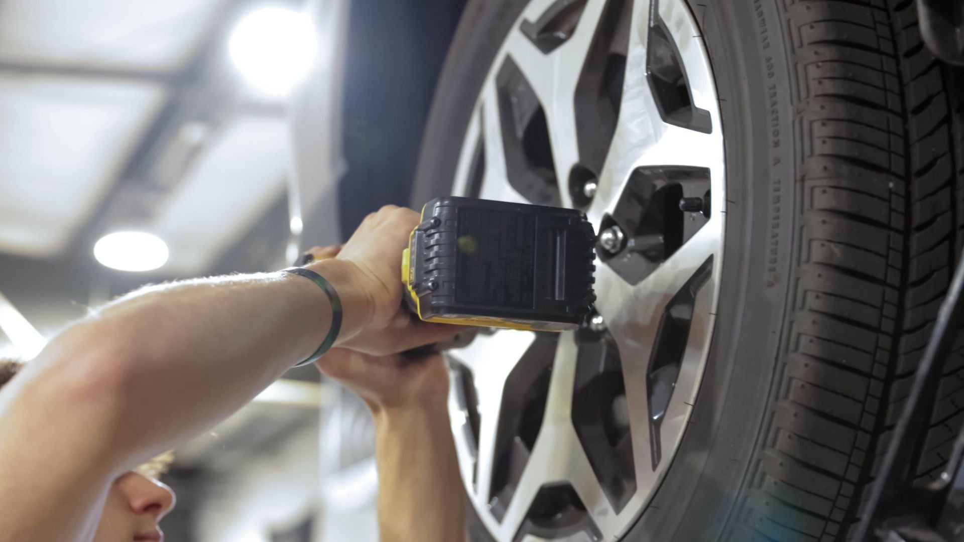 Tire being adjusted