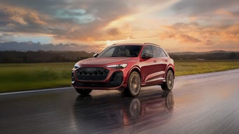Audi SUV driving along highway