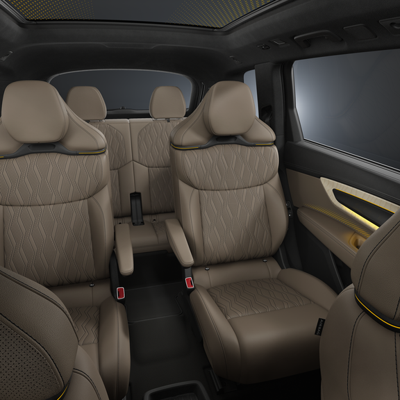 A view of the interior, focusing on the two rear rows of seats.