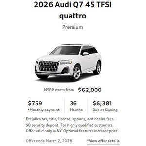 Side view on an Audi Q7 parked.