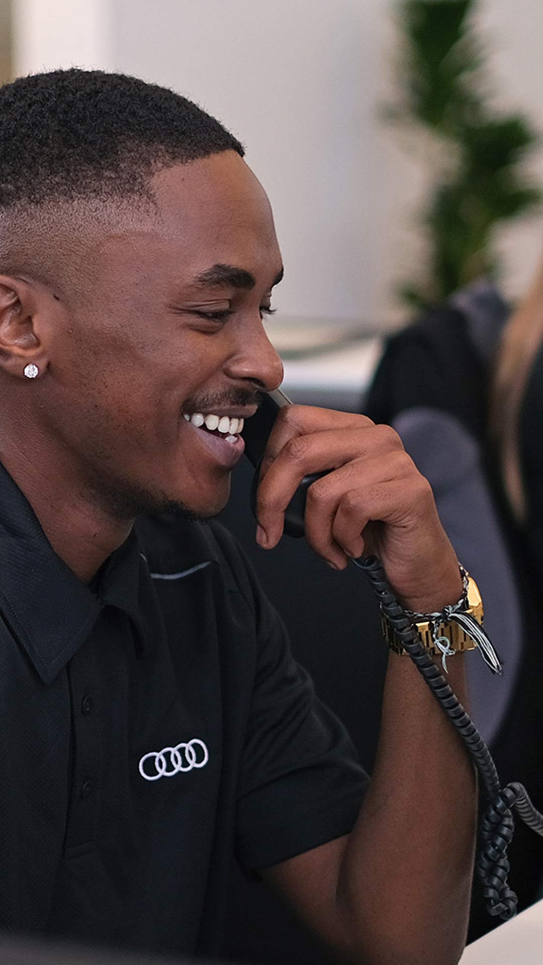 An Audi salesman on the phone