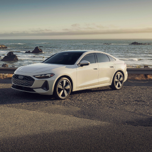 Side view of an Audi A5 parked.