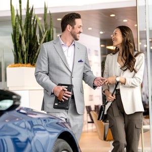 New Audi key handoff in the showroom — view new inventory at Audi Sewickley near Pittsburgh PA