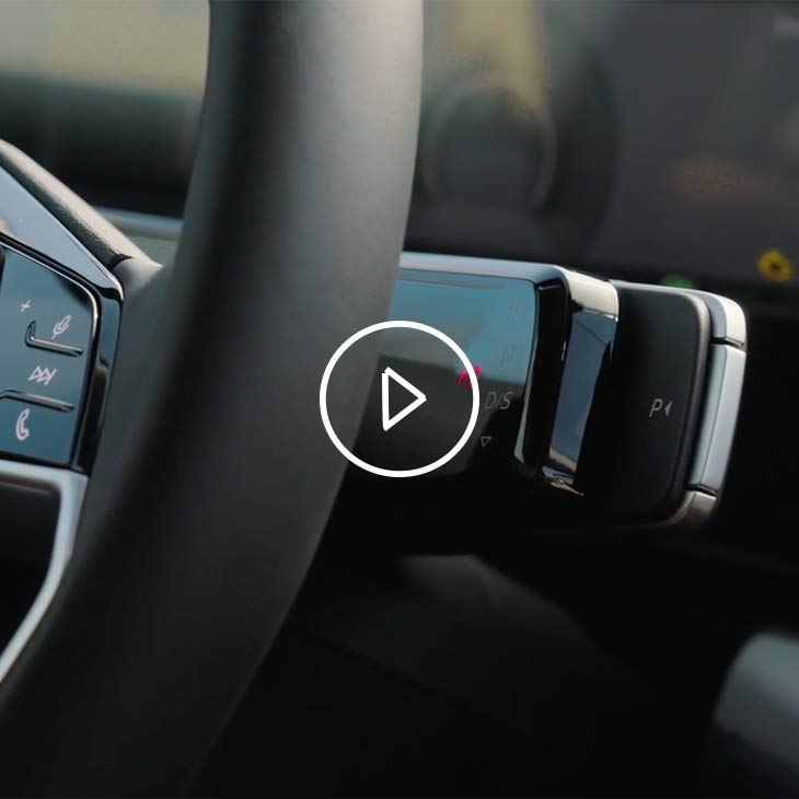 Close-up on an iPhone resting on the middle console of the Audi Q3.