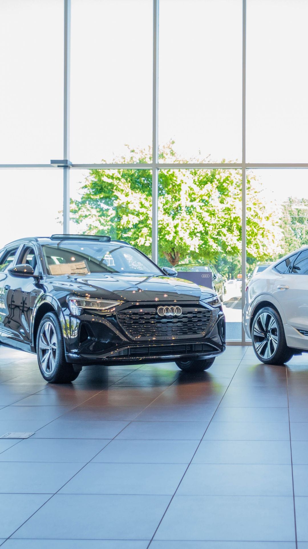 Rear profile view of an Audi Q5 parked.