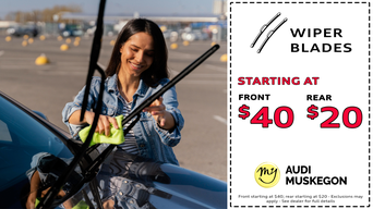 Service technician serving vehicle.